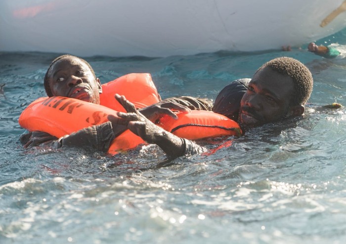 Oltre lo slogan dell'invasione: volti dei migranti. Incontro a Reggio